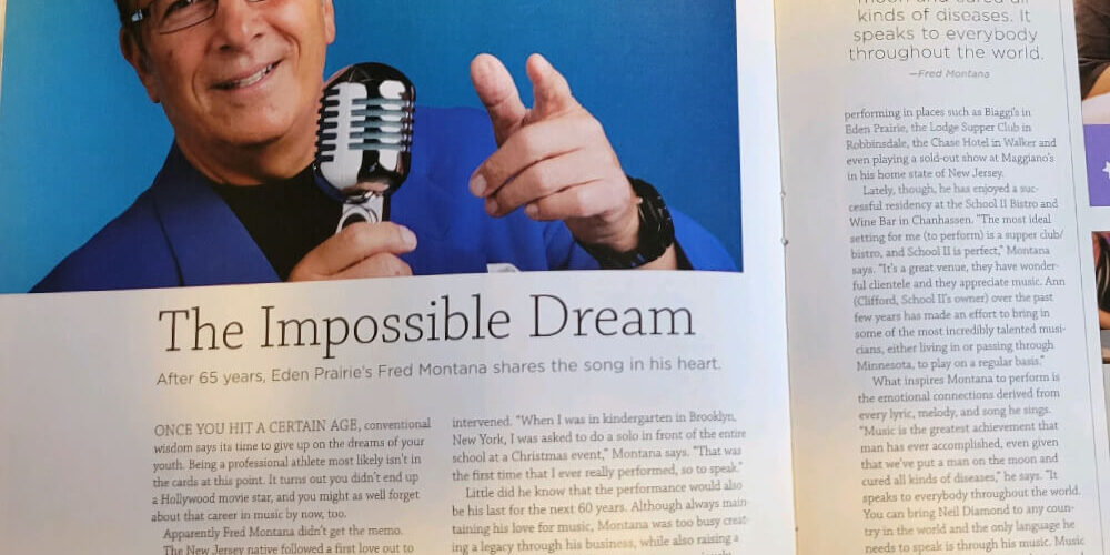 Man holding microphone, magazine article spread.